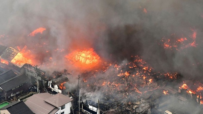 At least 140 buildings on fire in wind-swept blaze in Japanese city 